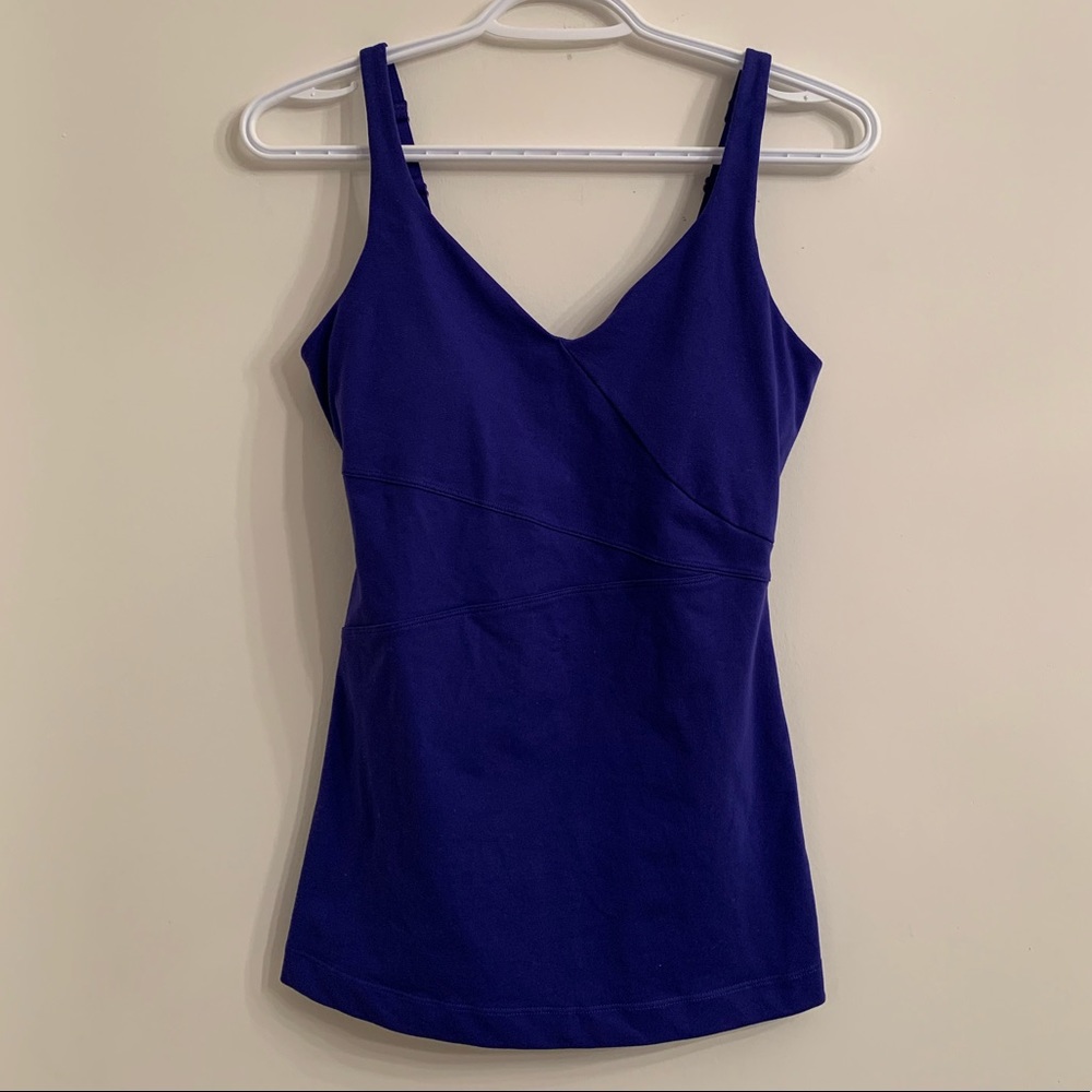 Under armour built in bra tank.  Similar to waist length lululemon align…